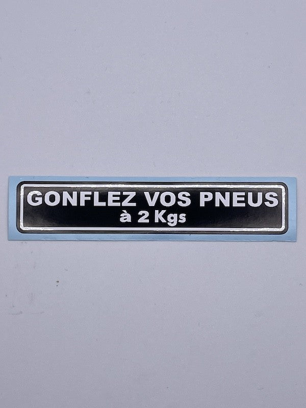 "Inflate your tires" sticker for hand pump