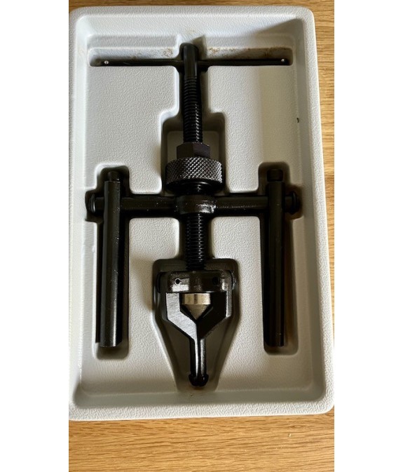 Outil extracteur de roulement de roue