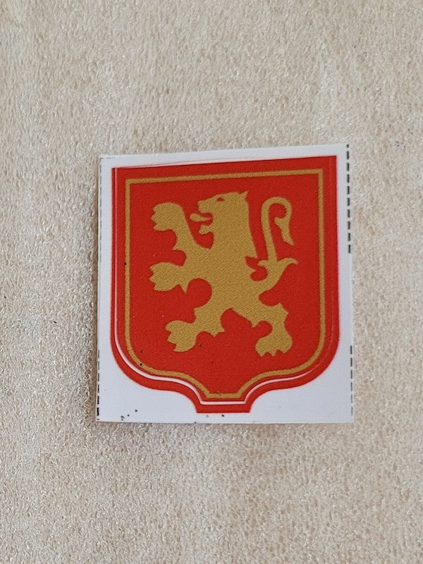 Red and gold Peugeot lion sticker