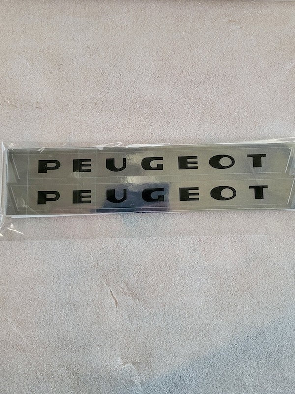 Chromed Peugeot stickers